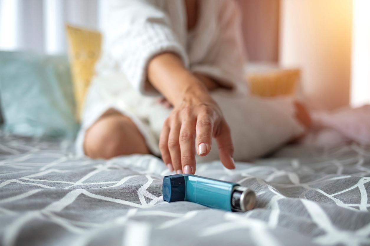 Asmathic girl catching inhaler